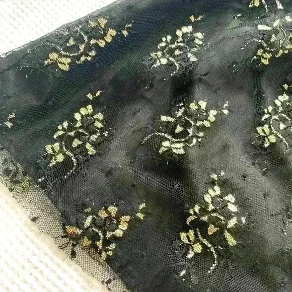 Black sleeveless dress with gold patterned bottom - Picture 2 of 2